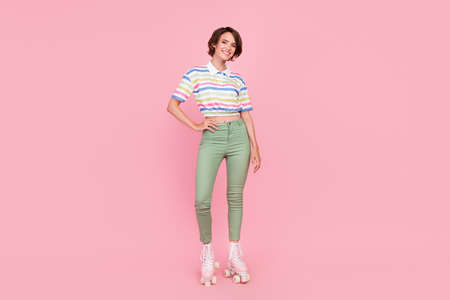 Full length photo of young sporty girl roller skates vintage skating rink spend weekend isolated...