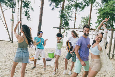 Portrait of attractive cheerful friends friendship dancing enjoying having fun carefree...