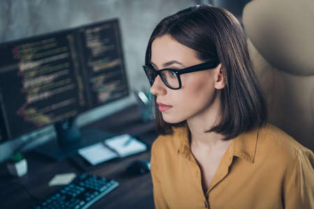Profile side view portrait of attractive smart clever qualified girl cyber engineer editor...