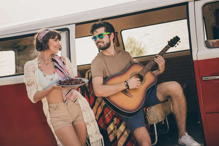 Photo of romantic affectionate youth couple enjoy minivan road stop picnic wear boho outfit nature...