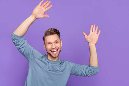 Photo of impressed brown hairdo guy say hello wear trend cloth isolated on violet color background