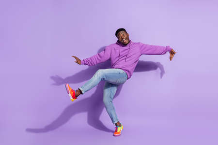 Full size of overjoyed person enjoy weekend holiday clubbing isolated on purple color backgroundの写真素材