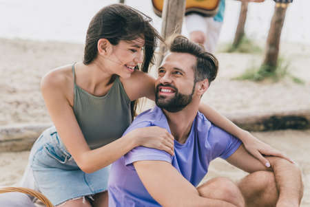 Portrait of attractive cheerful spouses people spending day weekend relax good weather tour at beach...