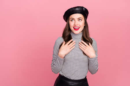 Portrait of attractive girly cheerful girl wearing nice look enjoying copy space isolated over pink...