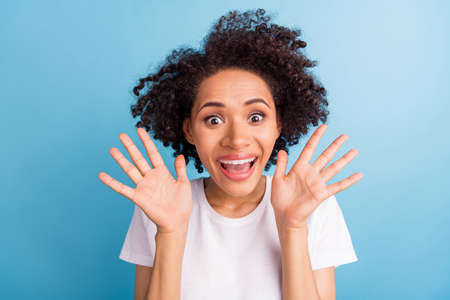 Portrait of young good mood funky excited cheerful afro girl fooling around childish emotion...