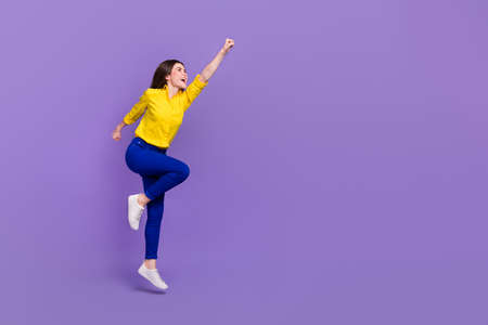 Full length body size view of attractive cheery energetic girl jumping striving isolated over bright...