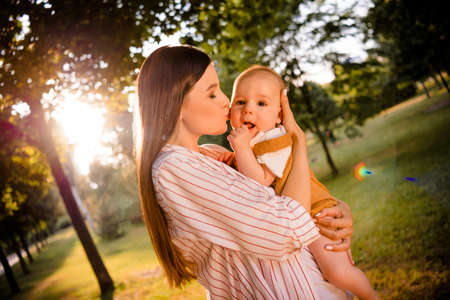 Photo of adorable sweet loving mom mommy lady rest relax outside forest kiss face prenatal year baby...