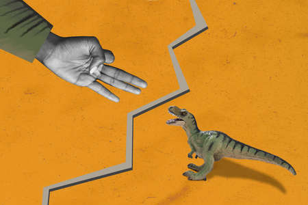 Creative abstract template graphics image of dino biting big huge arm showing thee fingers isolated orange drawing backgroundの写真素材