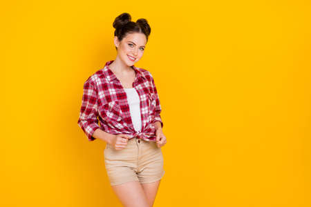 Photo of nice pretty youth lady tying her shirt buying boutique sale isolated shine color backgroundの写真素材