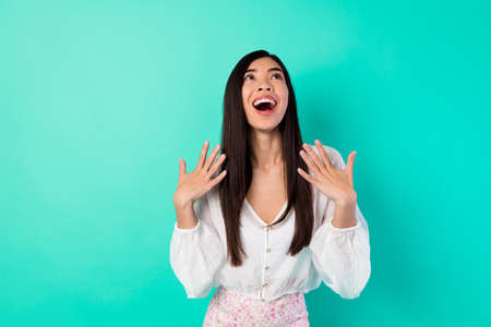 Portrait of excited astonished person look empty space open mouth unbelievable isolated on bright...