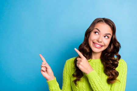 Photo of pretty woman wavy hairstyle fingers point useful tips wear stylish autumn green knitwear...