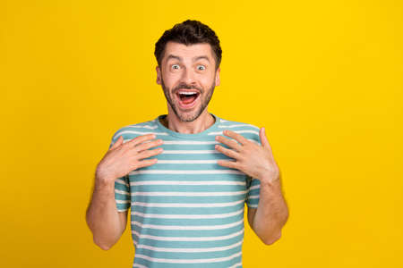 Closeup photo of young funny guy surprised hand showing himself win lottery become rich isolated on...