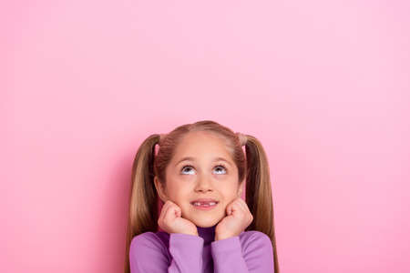 Portrait of pretty lovely girl look up see shopping huge bargains promotion isolated on pink color...