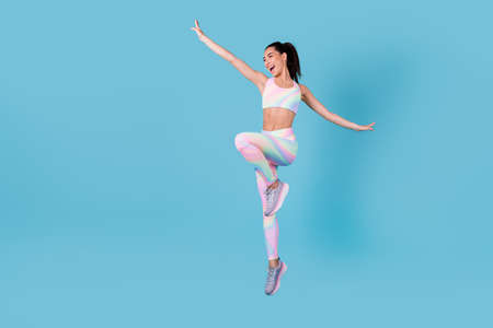 Full size photo of active chinese girl jump pilates shopping discount dressed trendy sporty outfit...