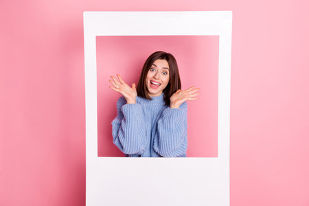 Photo of young happy cute girl surprised emotion make photo collage blog white paper windows...