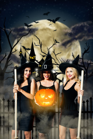 Vertical collage picture of three mysterious witch people hold broomstick carver pumpkin full moon horrifying castle flying batsの写真素材