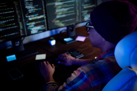 Profile cropped photo of intelligent hardware operator keyboard typing late evening workstation officeの写真素材