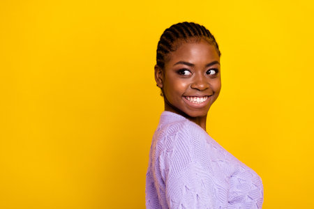 Profile portrait of gorgeous satisfied lady toothy smile look empty space isolated on yellow color...