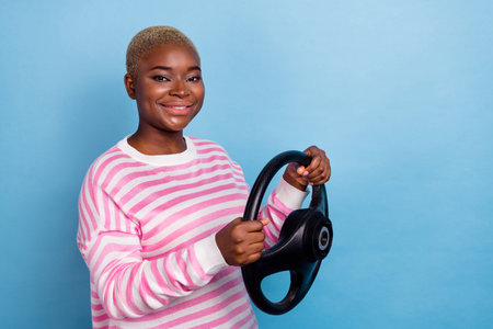 Profile side view portrait of pretty cheerful girl hold steering wheel have journey empty space...