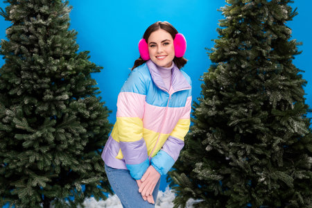 Photo of adorable lady wear cozy clothes walk outdoors preparing event choose green christmas tree...