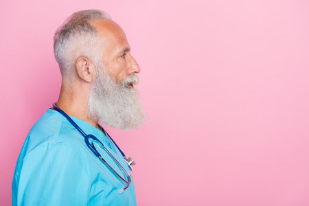 Profile side photo of professional cardiologist listen patient examine health empty space isolated on pastel color backgroundの写真素材