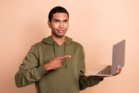 Photo of young experienced senior it developer python programmer man wear khaki hoodie direct finger...