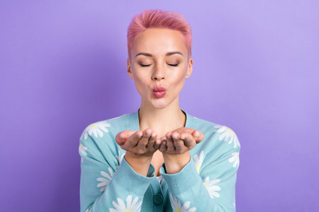 Portrait of gorgeous nice pretty girl with pink hairdo wear blue pullover lips send kiss to you...