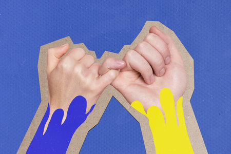 Creative collage picture of two people arms hold pinky fingers ukrainian flag colors isolated on blue backgroundの写真素材