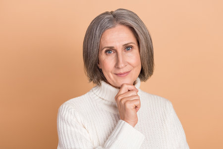 Photo of attractive charming touch chin wear white turtleneck elderly senior woman posing clean face...