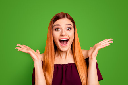 TOTAL SALE concept Close up portrait of crazy and excited girl with big eyes and open mouth isolated on yellow backgroundの写真素材