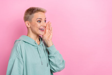 Photo portrait of lovely young lady palm cover mouth excited share secret dressed stylish khaki...