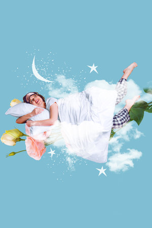 Vertical creative photo illustration collage of good mood impressed girl hug pillow laying on rose flowers isolated on blue sky backgroundの写真素材