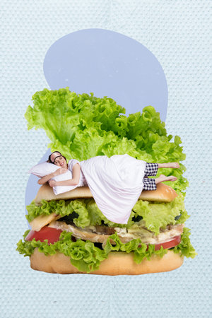 Vertical collage picture of positive funky mini girl laying sleep big burger instead bed isolated on creative backgroundの写真素材