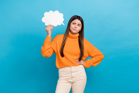 Portrait of minded person look arm hold empty space cloud figure card brainstorming isolated on blue...