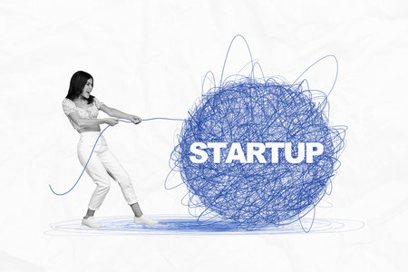 Collage portrait of black white effect hardworking girl arms pull rope painted big startup ball isolated on creative paper backgroundの写真素材