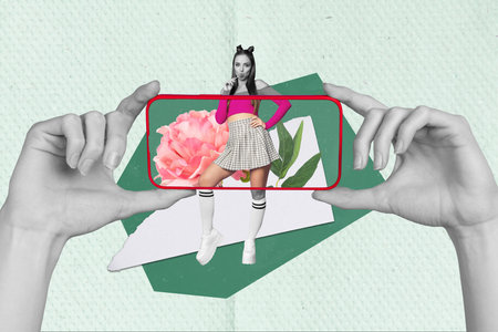 Photo of stylish wearing summer trends outfit girl youngster posing lick lollipop inside phone display isolated on green backgroundの写真素材