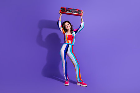 Photo of stunning glamour lady raise boom box start discotheque retro party isolated purple color...