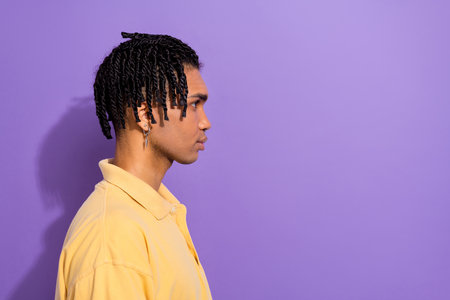Profile side photo of nice confident man wear trendy yellow clothes look empty space advert poster...