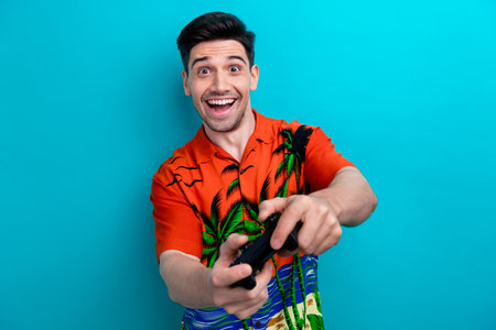 Photo of impressed funky man with stylish hairdo dressed print shirt hold joystick play excited game...