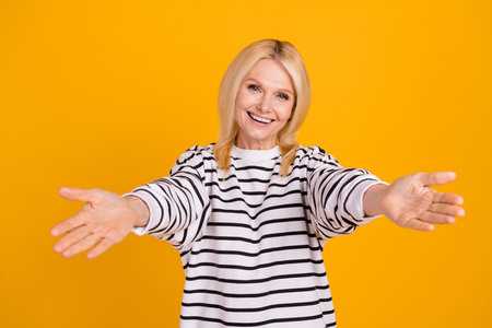 Photo of excited lady open hands hug friend after long waiting isolated shine color background