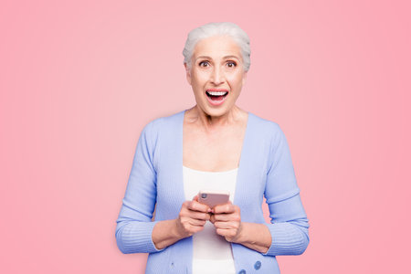 Modern granny Beautiful nice gray-haired excited old lady business woman wearing casual, received...