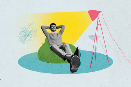 Collage portrait of cheerful minded black white effect guy sit beanbag under lamp light brainstorming isolated on drawing blue backgroundの写真素材