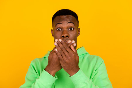 Portrait of impressed astonished man wear stylish pullover straing at unbelievable sale cover mouth...