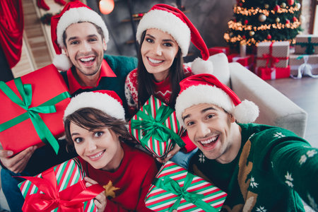 Portrait of group cheerful funky groupmates take selfie hold new year festive giftbox tree lights...