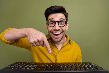 Photo of funky glad man professional hacker wear yellow trendy clothes coding site website isolated...