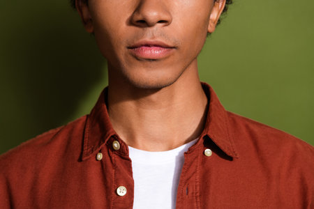 Close up photo of handsome young guy shopping promo wear trendy brown outfit isolated on khaki color backgroundの写真素材