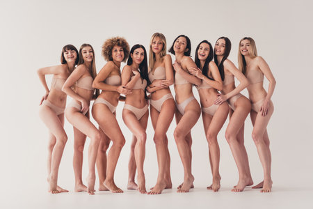 No filter photo of group attractive girls wear fashion lingerie have no shame love their body isolated pastel color backgroundの写真素材