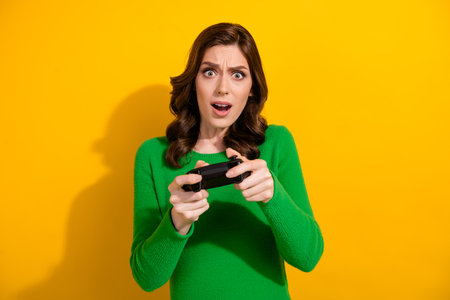 Photo of anxious embarrassed girl wear stylish green clothes playing game online oops failure...