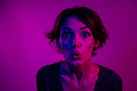 Photo portrait of attractive young woman shocked terrified face wear trendy overall clothes isolated...