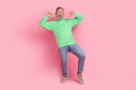 Full size photo of cool pensioner man point self proud winning lottery wear trendy green clothes isolated on pink color backgroundの写真素材
